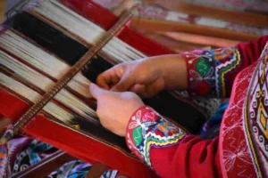 Andean woman weaving kada travel